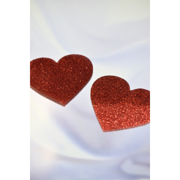 Paire de cache tétons adhésifs coeur pailleté rouge 